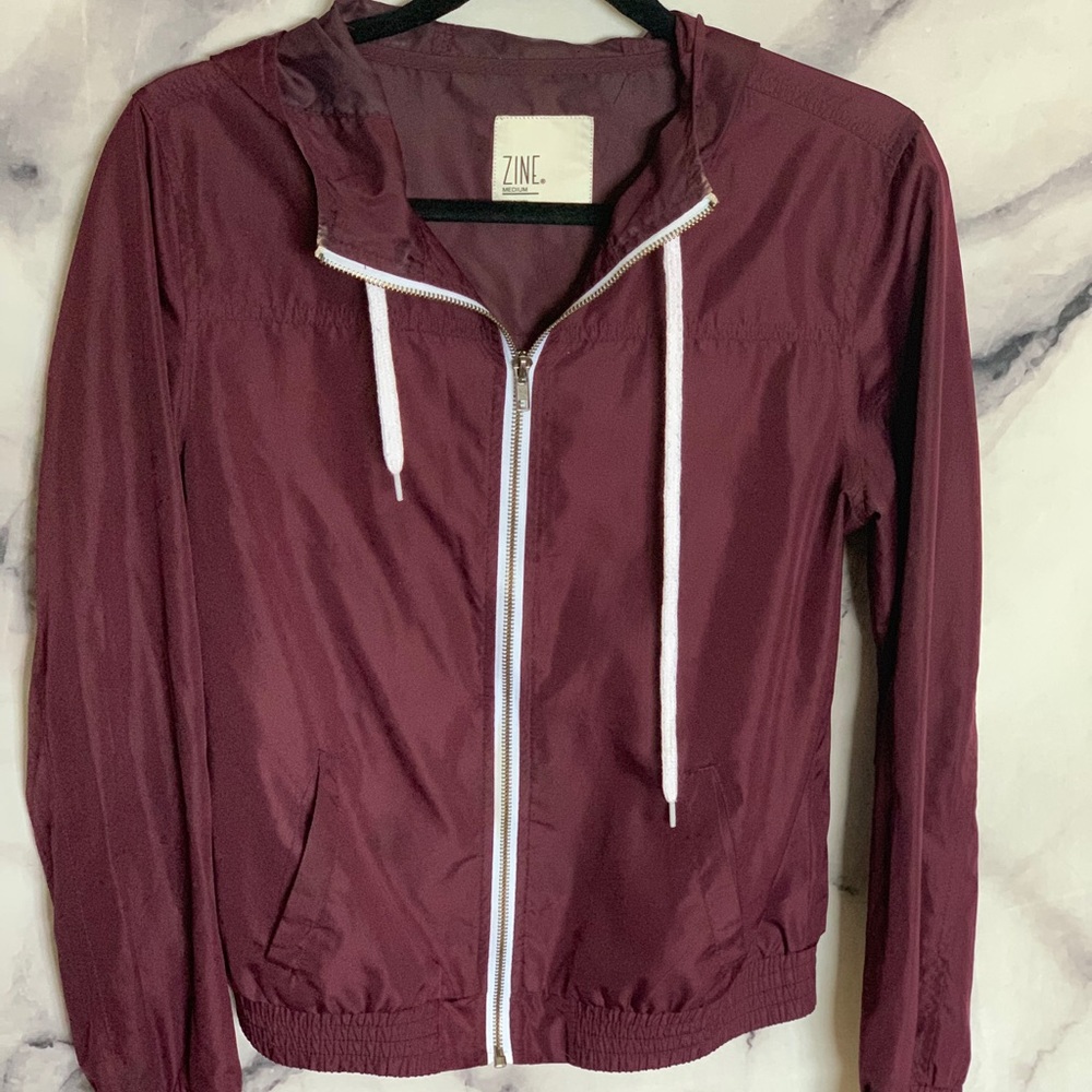 Purple Tilly’s windbreaker